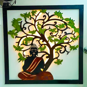 Image showing a serene sculpture of Lord Buddha seated under a Bodhi Tree, softly illuminated by LED lights, creating a peaceful and contemplative atmosphere.